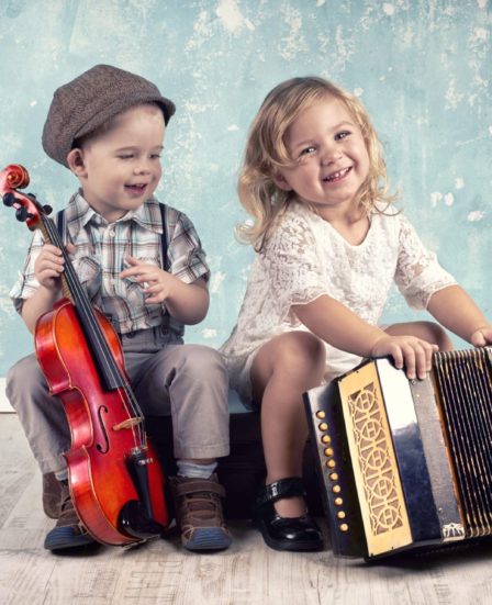 Cute,Little,Boy,With,His,Old,Violin,Is,Sitting,On